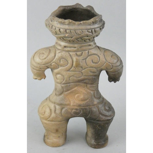 186 - A Japanese Dogu earthenware figure, age unknown, height 17 cm. Dogu were small humanoid and animal f... 