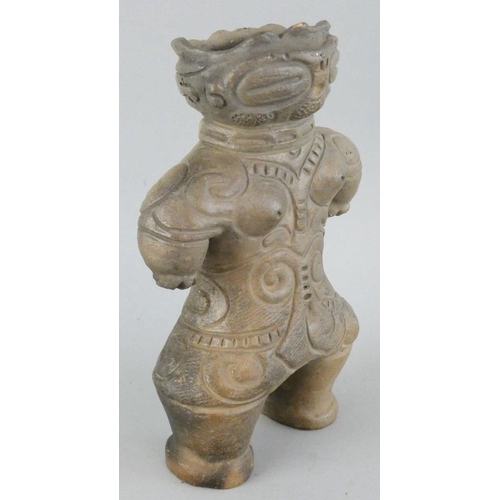 186 - A Japanese Dogu earthenware figure, age unknown, height 17 cm. Dogu were small humanoid and animal f... 