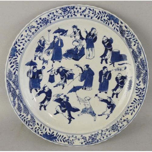 204 - A Chinese blue and white plate, Kangxi (1662-1722) mark and probably period, decorated with various ... 