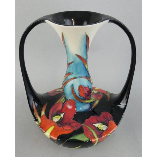 246 - A Moorcroft Satin Flowers tube lined double handled vase, designed by Nicola Slaney, shape 292/8, is... 