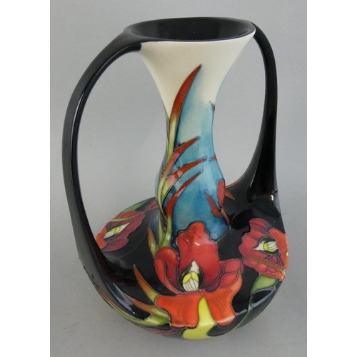 246 - A Moorcroft Satin Flowers tube lined double handled vase, designed by Nicola Slaney, shape 292/8, is... 