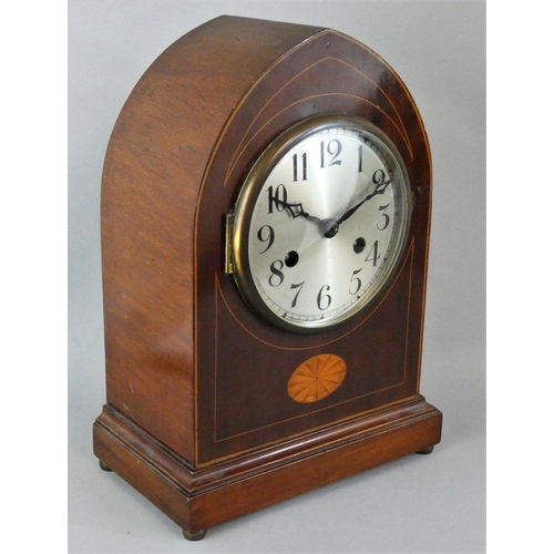 253 - An Edwardian mahogany and boxwood strung mantle clock, the silvered dial with Arabic numerals, the m... 