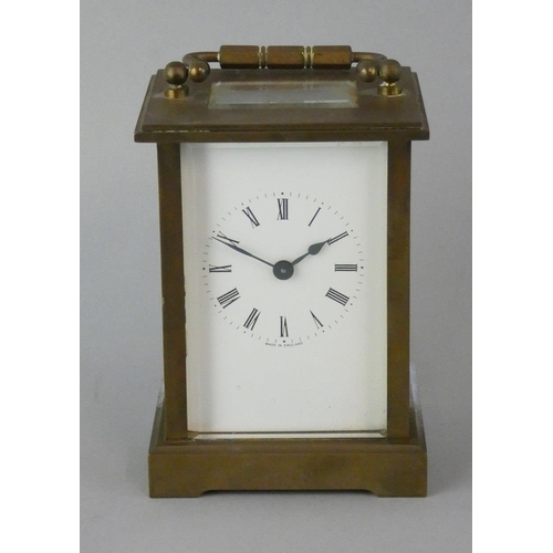 259 - A brass five glass carriage time piece, with white enamel dial, unsigned movement, height 11 cm.