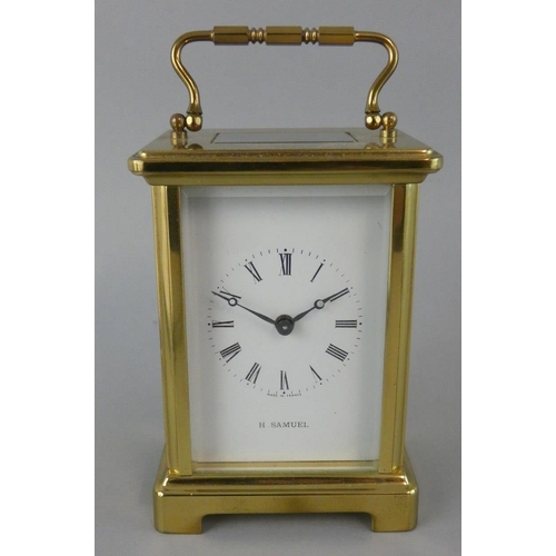 261 - H. Samuel, a brass five glass time piece, the white enamel dial with Roman numerals, the French move... 