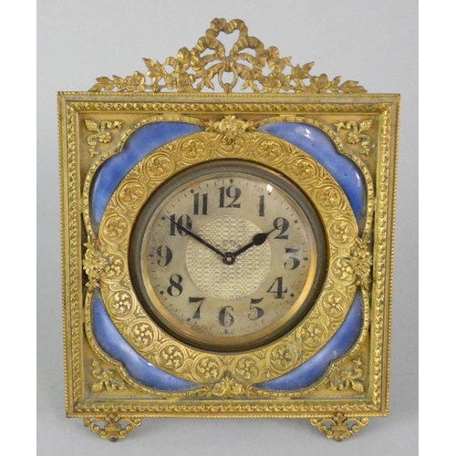 264 - An Edwardian gilt metal and blue enamel boudoir 8 day time piece with ornate frame, height 13.5cm