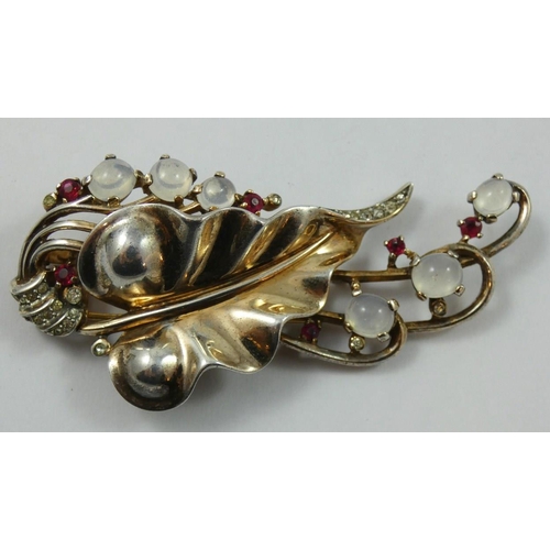 71 - Alfred Philippe for Trifari - a sterling silver gilt moonstone and red and white paste bracelet and ... 