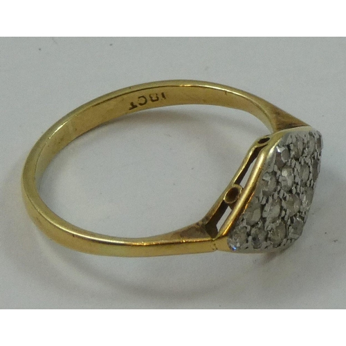 75 - An 18ct gold diamond set panel ring, set with single cut stones, size N.