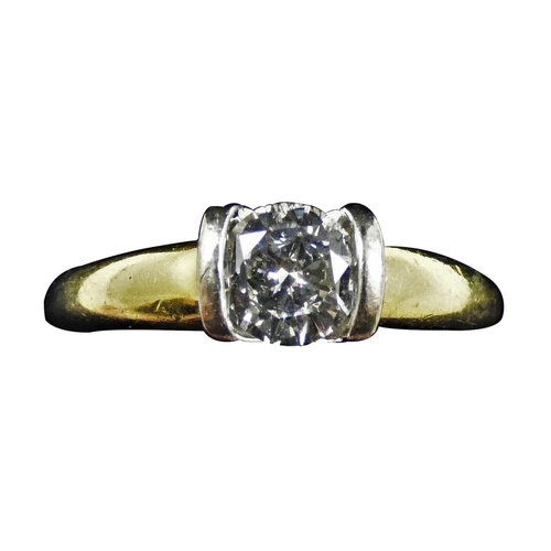 79 - An 18ct gold single stone diamond ring, set with a brilliant cut diamond, stated weight 0.67 cts, co... 