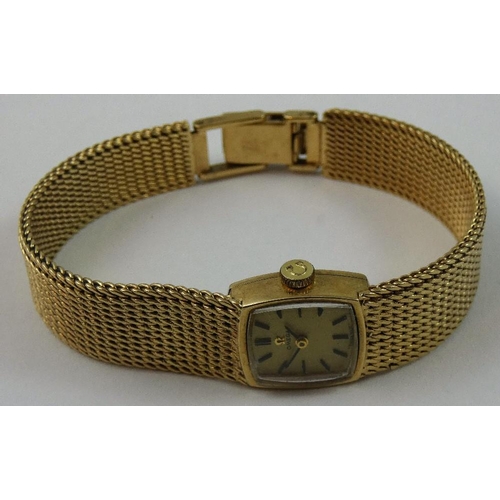 108 - Omega - a ladies 9ct gold manual wind wristwatch, with gilt dial, woven bracelet, weight without mov... 