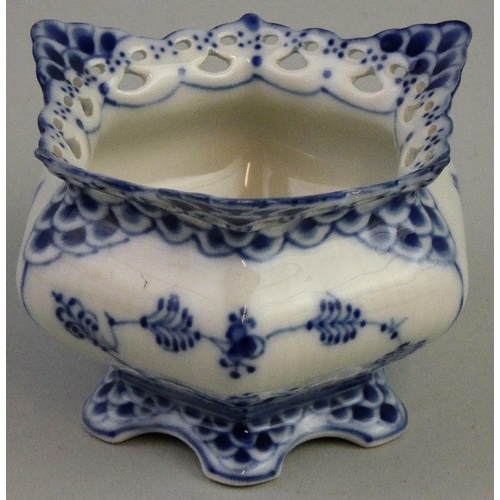 167 - A Royal Copenhagen porcelain tazza, in the Lace and Devil pattern, 1020, a bowl, 141, a sugar bowl, ... 