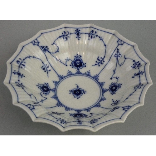 167 - A Royal Copenhagen porcelain tazza, in the Lace and Devil pattern, 1020, a bowl, 141, a sugar bowl, ... 