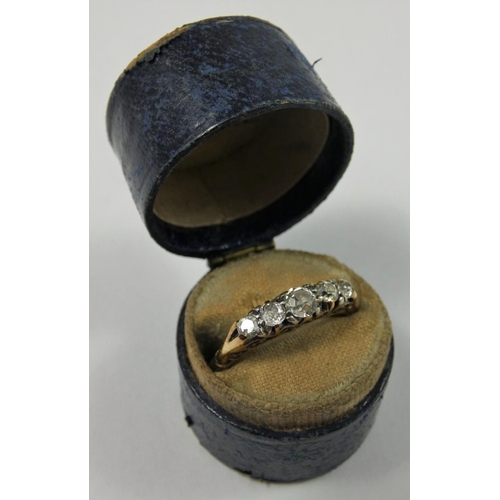 96 - A Victorian 18ct gold five stone diamond ring, carved claw set with graduated old cut stones, total ... 