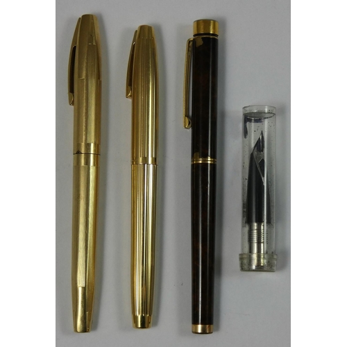 98 - A Sheaffer Imperial 797 gold plated fountain pen, a Sheaffer Imperial 585 gold plated fountain with ... 