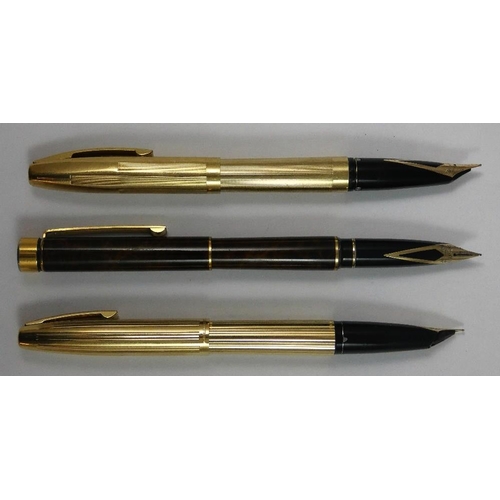 98 - A Sheaffer Imperial 797 gold plated fountain pen, a Sheaffer Imperial 585 gold plated fountain with ... 