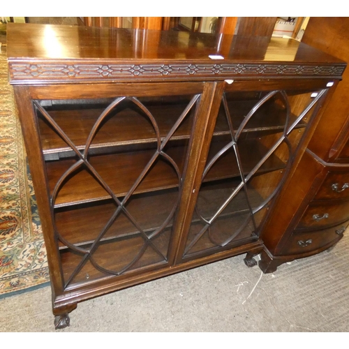 194 - A mahogany display cabinet with astragal glazed doors, raised on ball and claw feet, 100cm long x 11... 