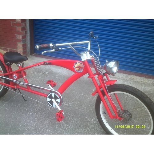 46 - Red Baron - a custom built bicycle, in the form of a stretched cruiser, 3 speed gears, hub brakes, 7... 