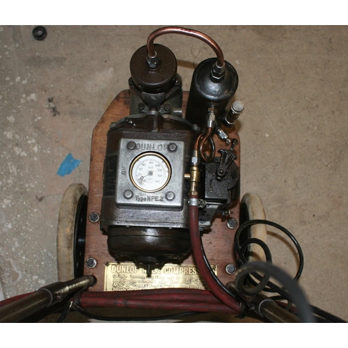 20 - A Dunlop Type NPE.2 tyre compressor, mounted on a trolley, (untested).