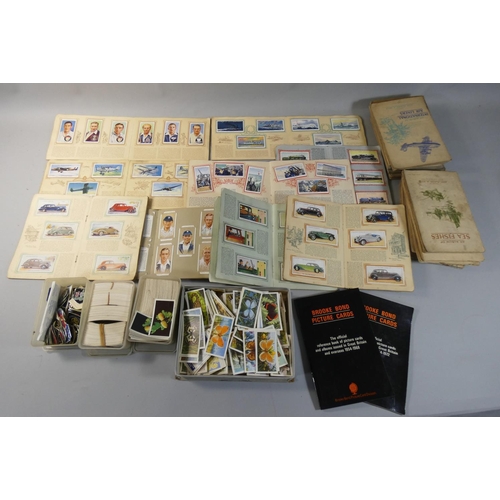 87 - An extensive collection of cigarette and tea cards, part and full sets boxed and in booklets, bookle... 