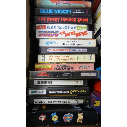 Approximately fifty ZX Spectrum cassette tape games in small Approximately fifty ZX Spectrum cassette tape games in small