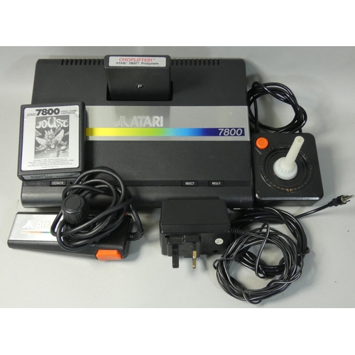 125 - An Atari 7800 video games console, together with power supply unit, 2 x 7800 cart games; Choplifter!... 