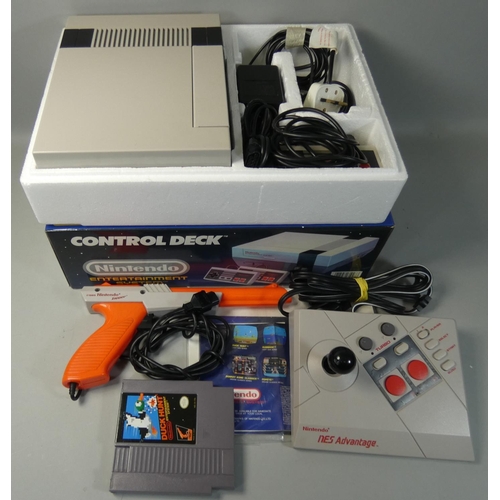 115 - A boxed Nintendo Entertainment System console, complete and working, serial No. PM1769696, with powe... 