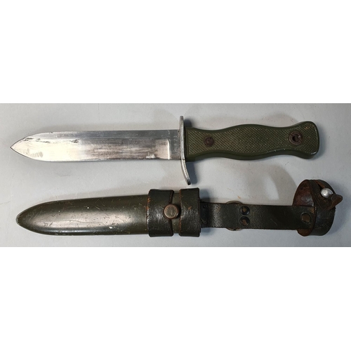 69 - A Bundeswehr German Army Fighting Knife HSK70, with 14cm single edge blade, moulded green plastic sh... 