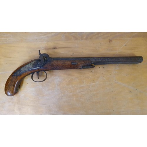 74 - A 19th century percussion cap pistol, with octagonal barrel.