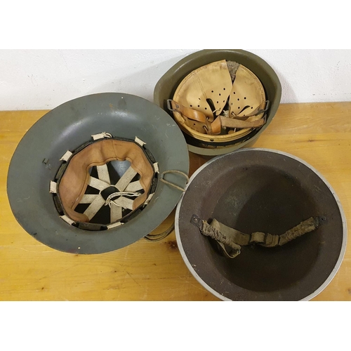 62 - A English WWII type helmet, an USA helmet and another helmet, no markings (3).