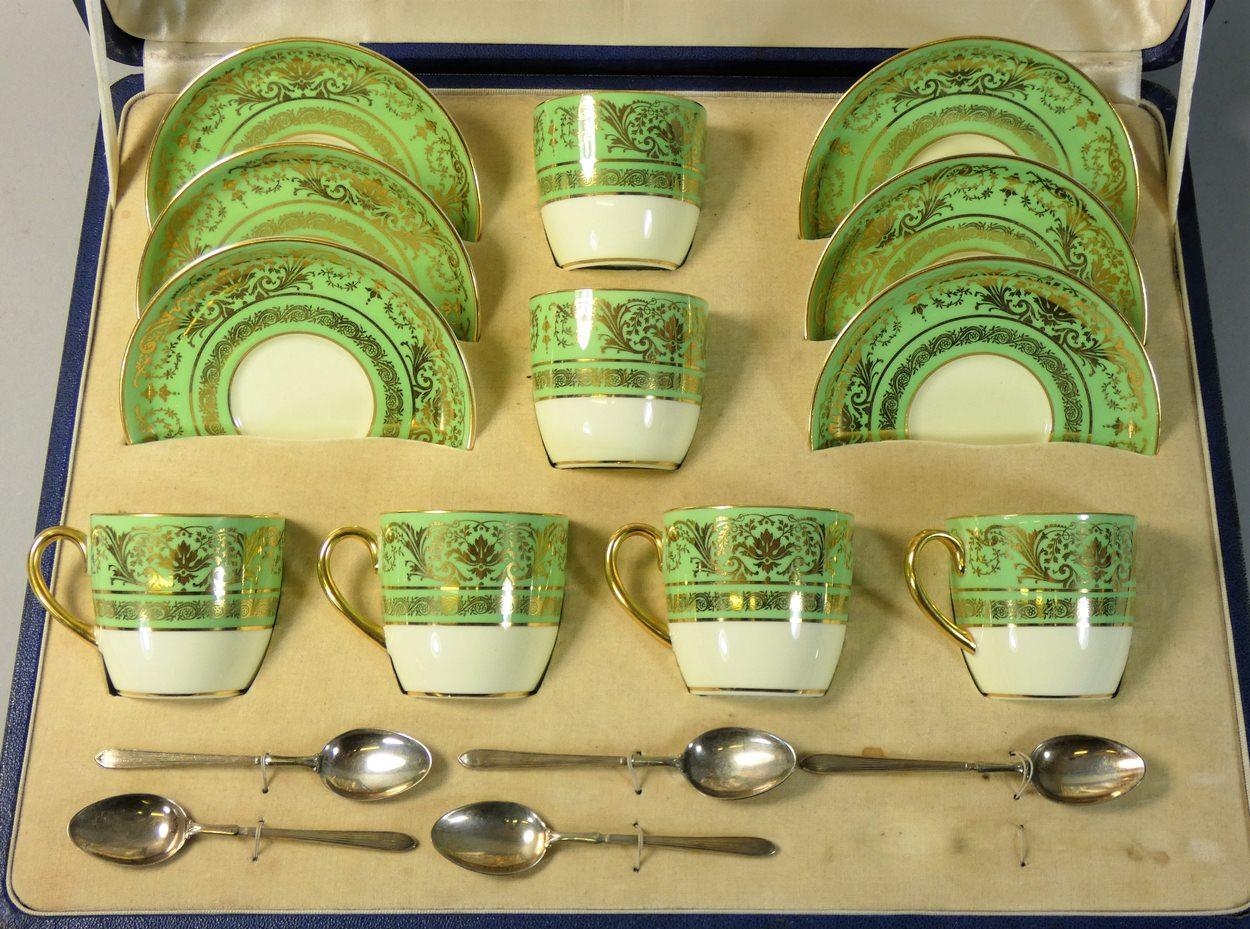 An Art Deco Cauldon china cased set, comprising set of six green and gilt  demitasse coffee cups and