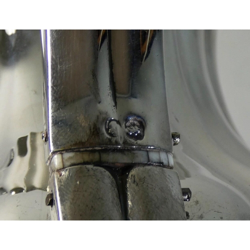 19 - A William IV silver coffee pot, by George Burrows II, London 1826, of lobed baluster form, raised on... 