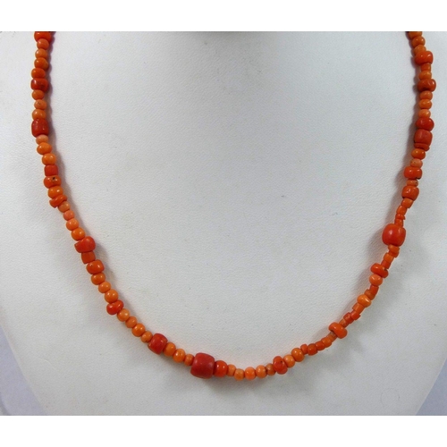 24 - A Victorian coral bead single row necklace, another smaller and a pair of earrings, weight of neckla... 