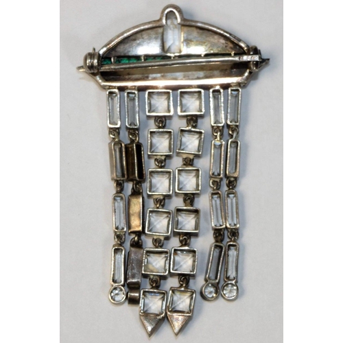 38 - An Art Deco sterling silver and paste Art Deco tassel brooch, set with green a clear paste stones an... 