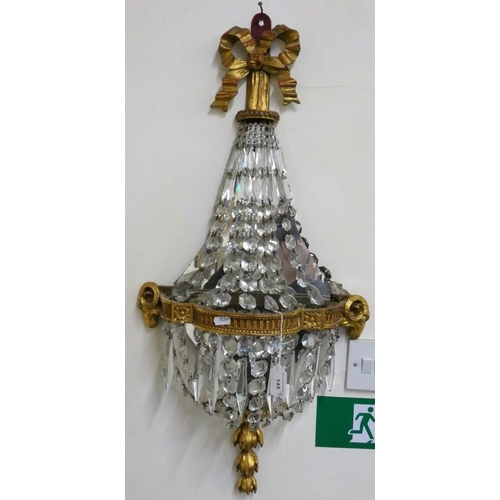 145 - Four Edwardian electric wall lights mirror backed with glass droplets, gilt decoration 80 cm long (4... 