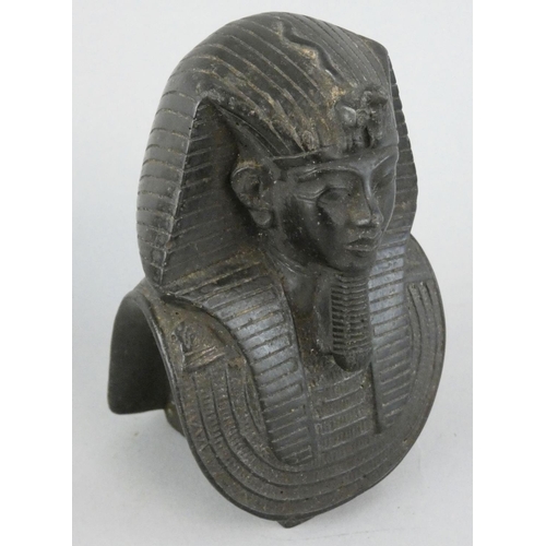 139 - A 20th century black glass Tutankhamun bust, with signature to base, 10 cm.