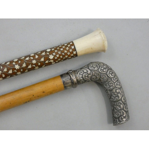 149 - A 19ct century Anglo Indian walking cane, the hardwood stick inset with ivory lozenges, ivory surmou... 