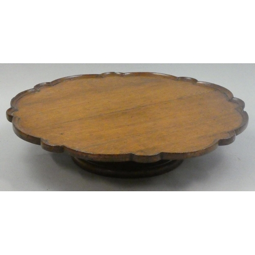 159 - A Victorian oak Lazy Susan, with pie crust border, raised on a pedestal, diameter 55 cm.