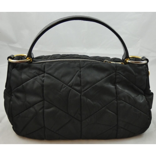 168 - Prada, a black Tessuto Quiltin nylon hand bag, model BR3774, with certificate and dust bag.