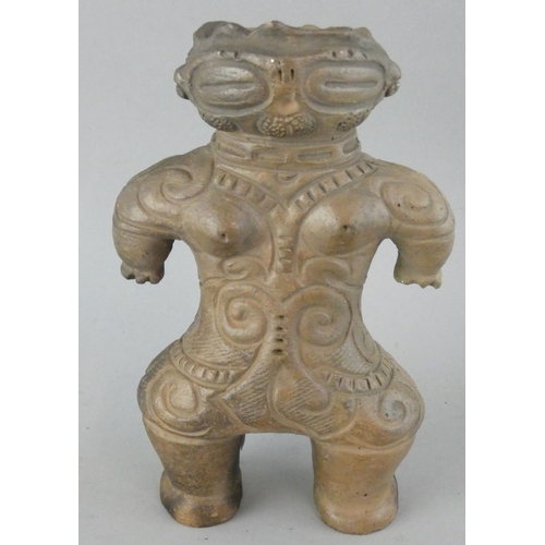 186 - A Japanese Dogu earthenware figure, age unknown, height 17 cm. Dogu were small humanoid and animal f... 