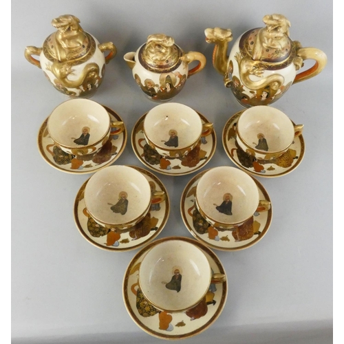 193 - An early 20th century Japanese Satsuma tea service for six settings, comprising tea pot, hot water p... 