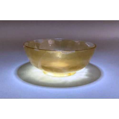 203 - A Chinese off white jade dish, probably late Qing Dynasty or Republican Period, of plain form with a... 