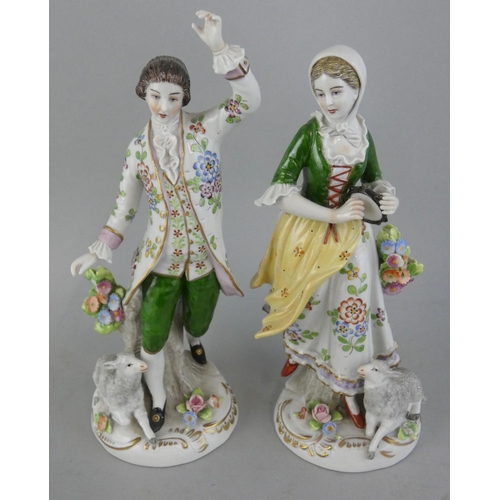 223 - A pair of Sitzendorf porcelain figures, depicting a lady with a tambourine and a gentleman dancing, ... 