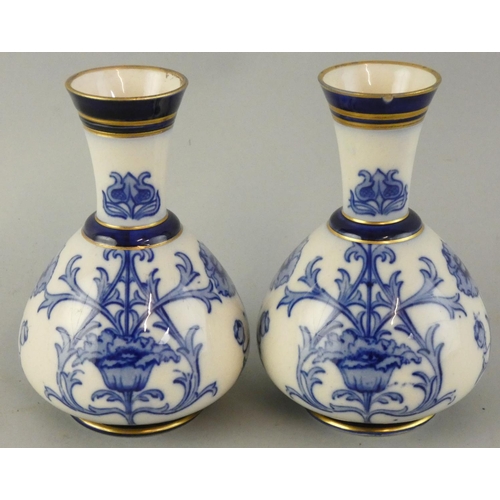 242 - A pair of McIntyre Moorcroft Aurelian ware Art Nouveau floral vases, registered number 314901 and pa... 