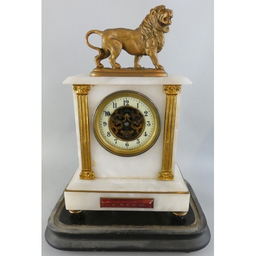 256 - A 19th century French white marble and gilt metal exposed escapement mantle clock, the architectural... 