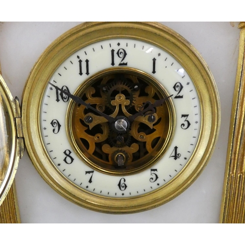 256 - A 19th century French white marble and gilt metal exposed escapement mantle clock, the architectural... 