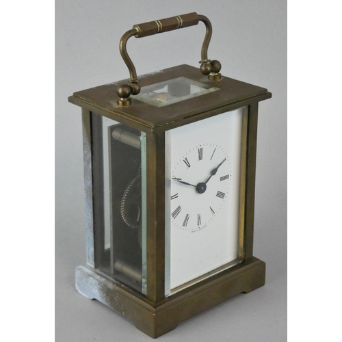 259 - A brass five glass carriage time piece, with white enamel dial, unsigned movement, height 11 cm.