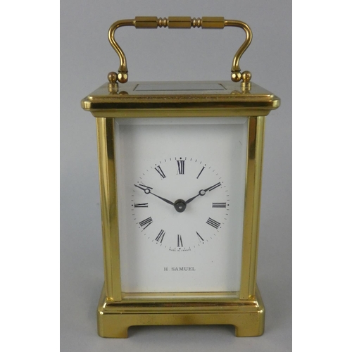 261 - H. Samuel, a brass five glass time piece, the white enamel dial with Roman numerals, the French move... 