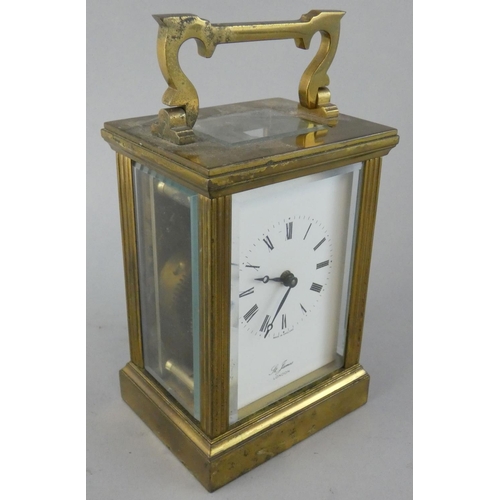 262 - St. James, London, a five glass brass carriage time piece, white enamel dial with Roman numerals, 11... 