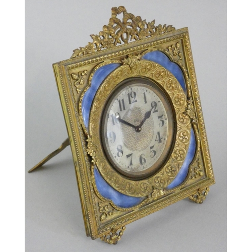 264 - An Edwardian gilt metal and blue enamel boudoir 8 day time piece with ornate frame, height 13.5cm