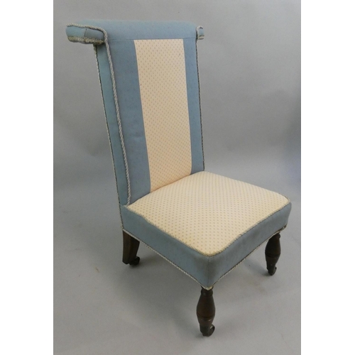 281 - A Victorian Prie Dieu upholstered chair, upholstered in pale blue fabric.