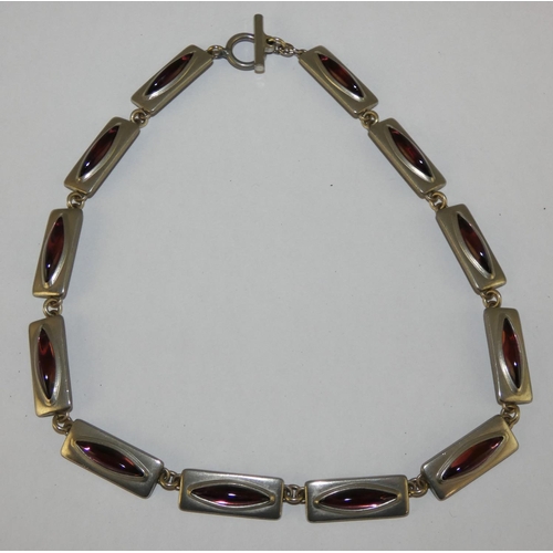 66 - Jorgen Jensen, a pewter and amethyst glass necklace, c. 1960, composed of twelve panels, signed and ... 